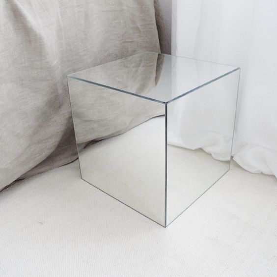 an ultra-minimalist mirror cube table with no edges or frames made of IKEA items completely