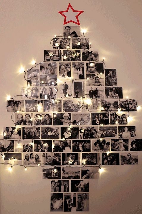 A wall mounted Christmas tree made of photos and decorated with lights is a very personal and intimate idea