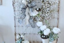 26 a snowy star branch wreath with a fake bird nest and a large ribbon bow and a fake bloom for shabby chic decor