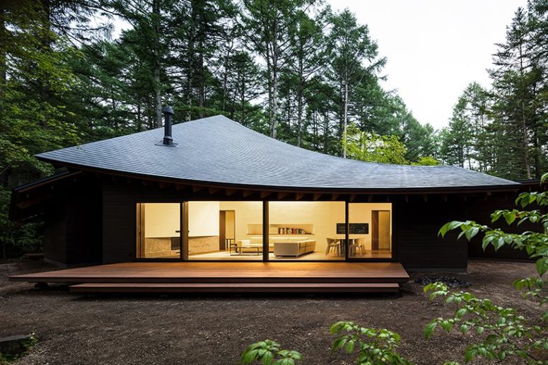 This unique minimalist weekend home looks like a pile of leaves and it's really inspired by one