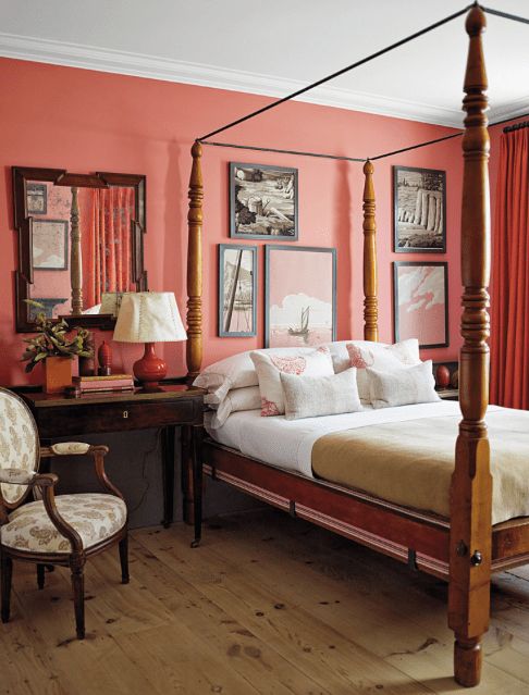 a statement wall and curtains in the vintage bedroom give it a bit of edge and much color