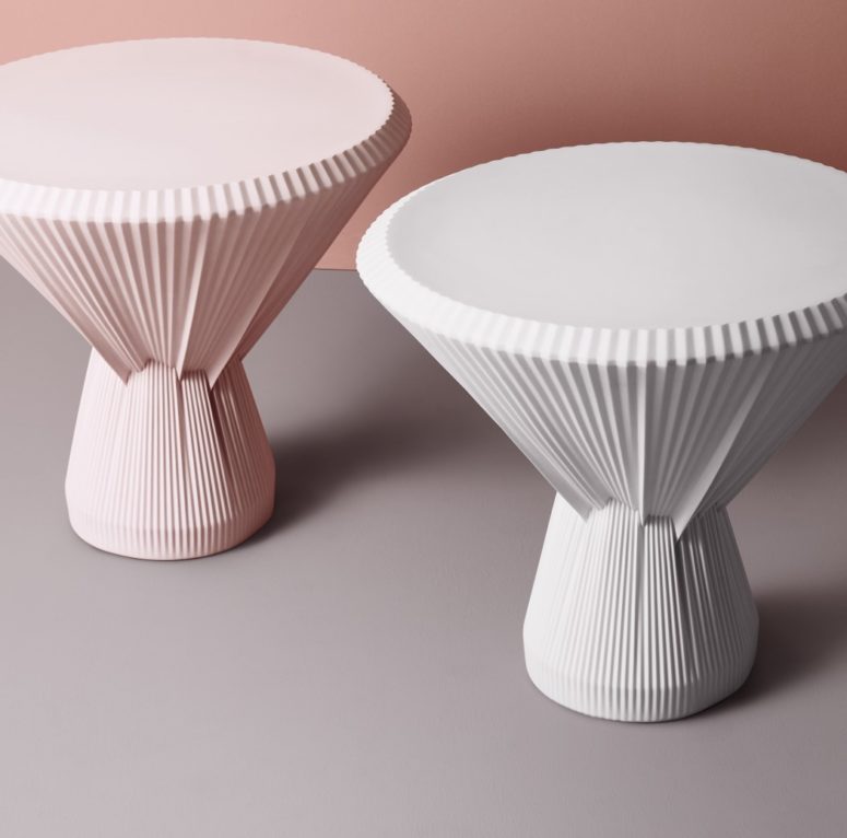 The tables are available in two colors - off-white and blush