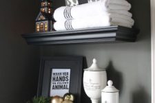 03 go for some chic displays on the shelves, next to your towels, they won’t take too much space