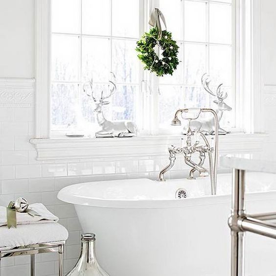 hang a small and cute wreath on the window, add a couple of deer over the bathtub and holidays are here