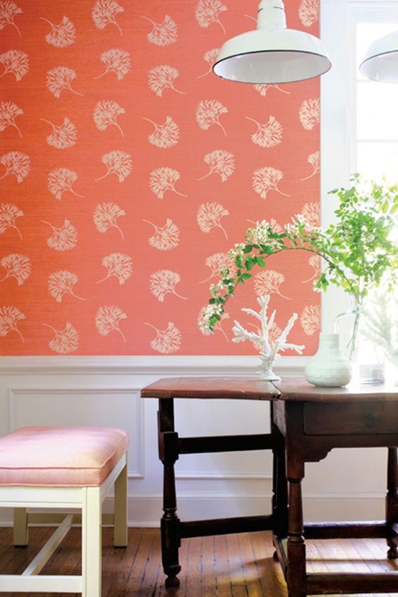 a coral botanical print wallpaper wall is great to refresh your breakfast nook and make it warm and inviting