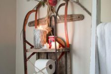 05 use a vintage sleigh as a shelvign unit on a wall, add candles, ornaments and evergreens