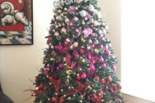 06 a bold ombre silver to pink and red Christmas tree with lights, fabric flowers and bows plus a creative topper