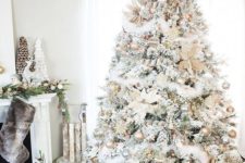 08 a neutral snowy Christmas tree with metallic glitter ornaments and lights is great as it has enough impact