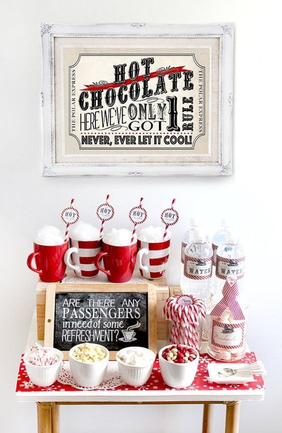 a gorgeous festive hot chocolate station with sweets done in traditional red and white