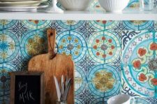 12 blue mosaic tiles on your backsplash make your kitchen really Mediterranean
