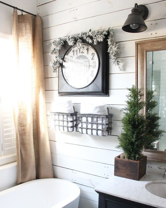 refresh your bathroom decor with some evergreens and maybe metallic touches, they are easy to add
