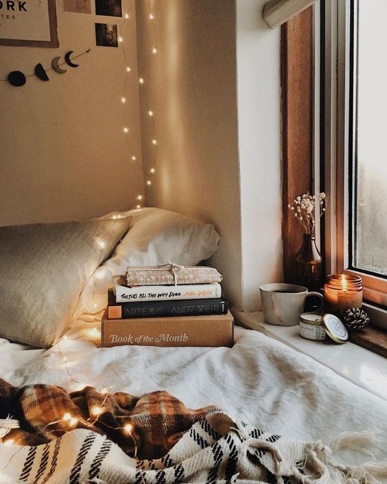 create a cozy reading nook by the window and if natural light isn't enough, add LEDs