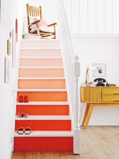 Spruce up your home decor with bold stairs with an ombre effect, from light pink to deep red