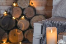 15 candles paired with lights create a hygge ambience at once, you won’t need much