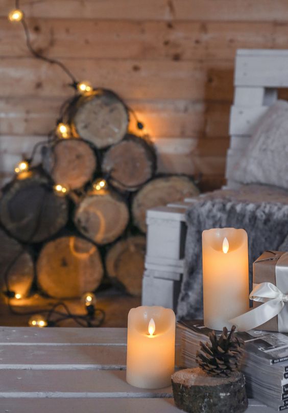 candles paired with lights create a hygge ambience at once, you won't need much