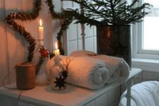 cozy scandinavian bathroom decorated for christmas