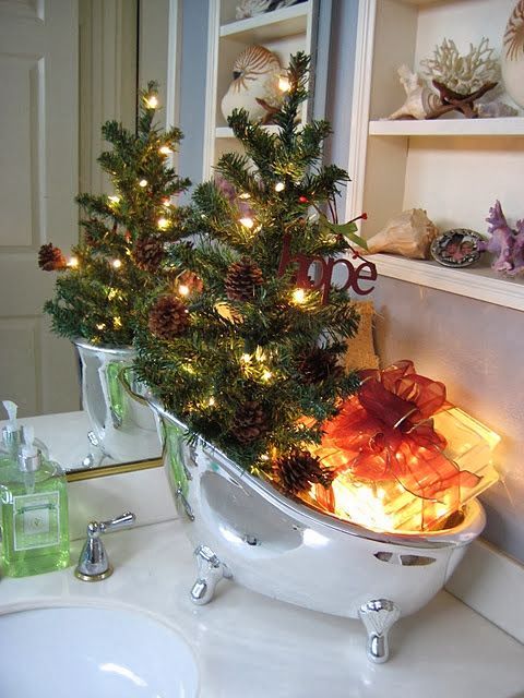 fill your soap bowl with lights, gifts and a Christmas tree with pinecones and lights instead of soaps