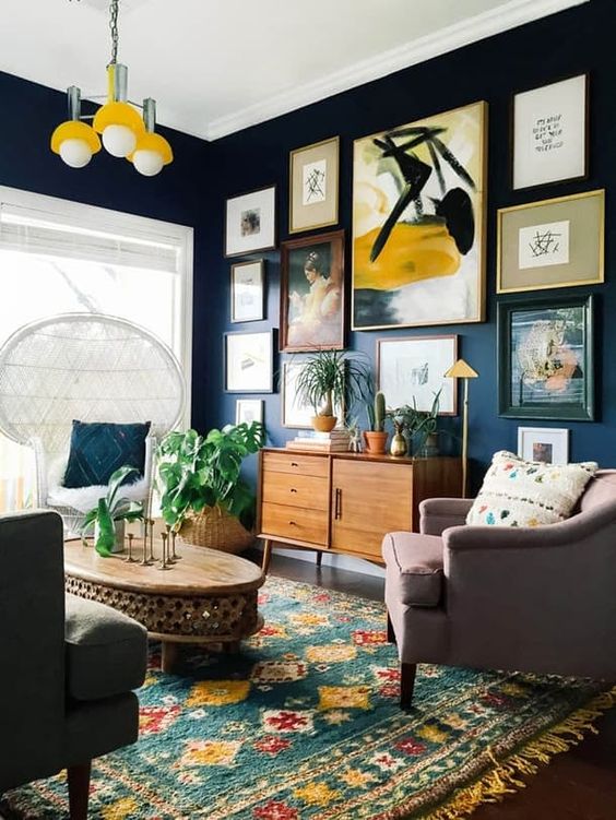 a gallery wall is often a bold and colorful centerpiece idea for an eclectic space, besides, it's trendy