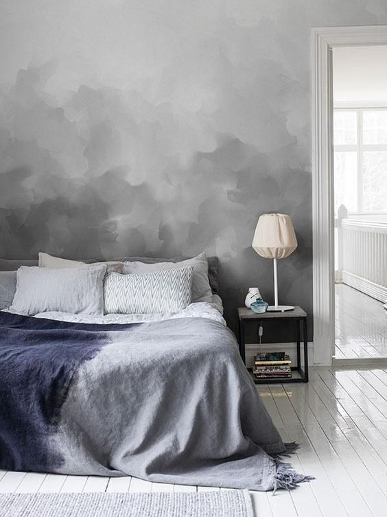 a grey ombre statement wall in your bedroom will make it more peaceful and welcoming
