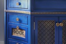 17 an exquisite Mediterranean vanity in blue with laser cut inserts and vintage knobs brigns Mediterranean chic