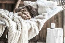 17 faux fur and knit blankets are amazing for creating a soft and welcoming space with a hygge feel