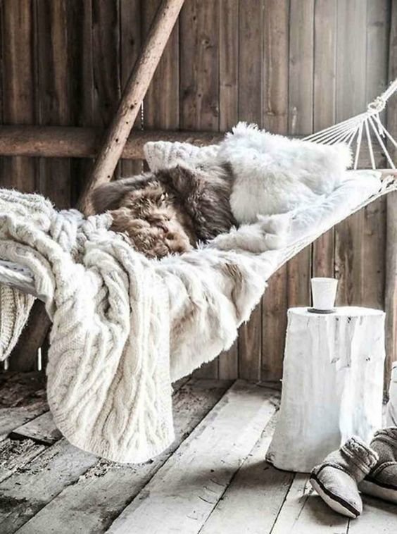 faux fur and knit blankets are amazing for creating a soft and welcoming space with a hygge feel