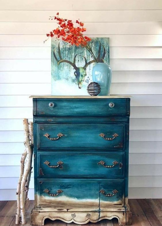 a gorgeous ombre vintage dresser from teal to neutral wooden shades is perfect item for a beach home