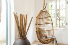 simple room design with a wicker chair