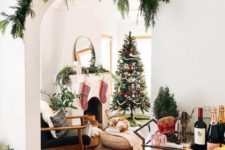 19 cover the archways with evergreens to make the space feel festive and not taking any floorspace