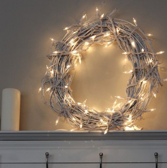 a white vine Christmas wreath with lights is a cool and simple DIY idea for holidays, it won't take much time to make