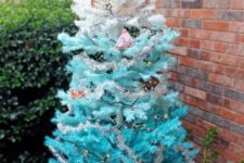 24 an ombre outdoor Christmas tree from white to light blue and bold blue with lights and some decor can be easily DIYed