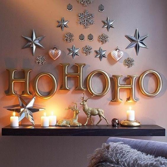 metallic letters and metallic hearts and stars attached right to the wall for holiday vibes