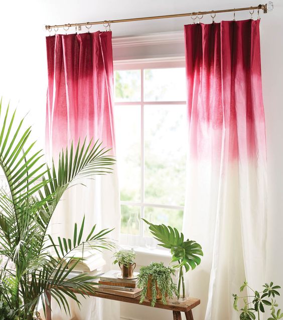 ombre curtains from deep red to pink and white is a cool color touch that can be DIYed