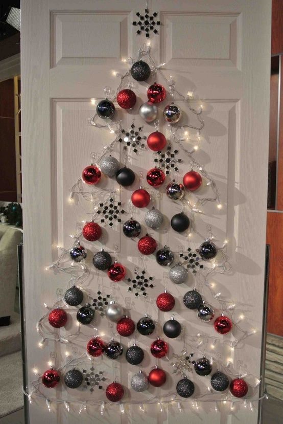 a Christmas tree can be created on a door, too, no floor space is required here