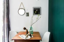 25 a statement emerald wall adds color to the space and can be changed and repainted anytime