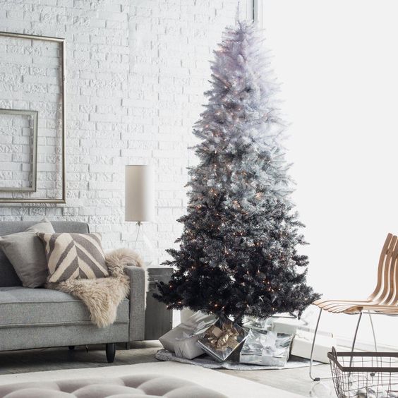 if you want a monochromatic Christmas tree, rock an ombre one from white to silver and black and add lights for a modern look