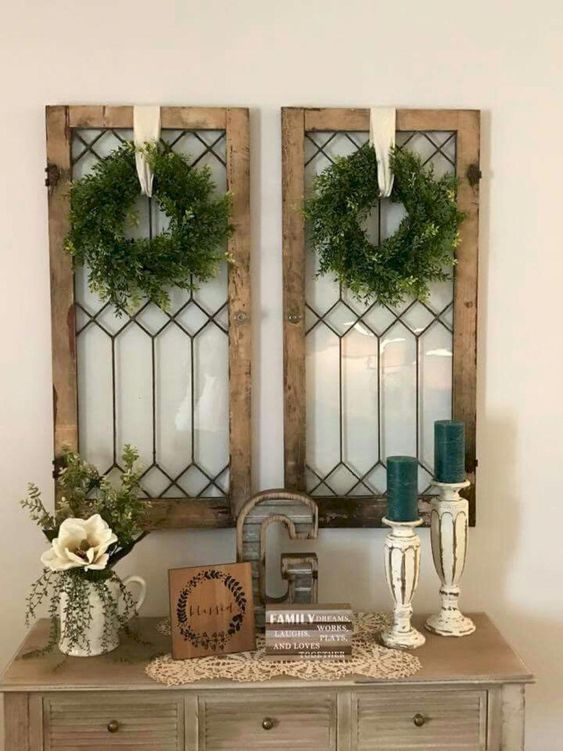shabby chic windows with boxwood wreaths and ribbons hanging on them are amazing for Christmas