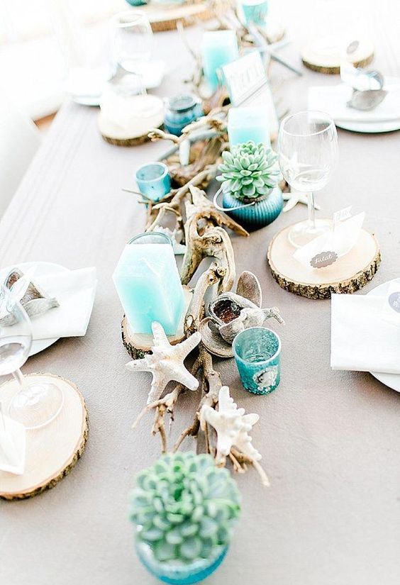 style your table with succulents in turquoise pots, turquoise candles and candle holders, star fish and driftwood