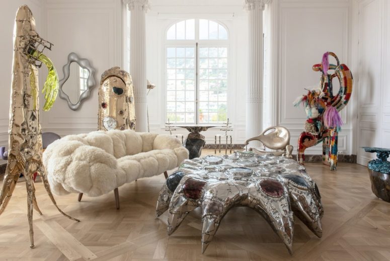 This unique coffee table wows, it's a gorgeous design with large rhinestones that is inspired by a sea creature