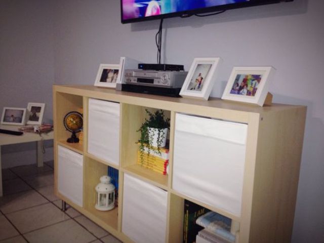 IKEA Kallax shelving unit with Drona boxes for a cheap TV stand