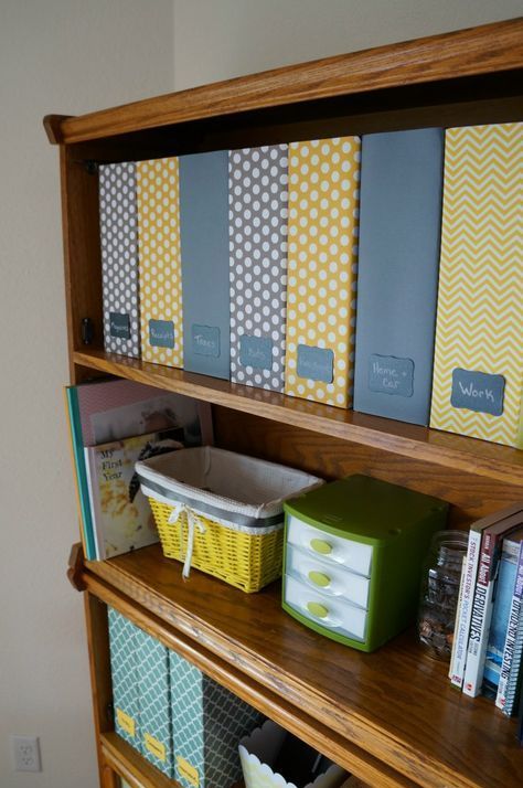 a stylish and comfortable family filing system with colorful printed files and chalkboard tags