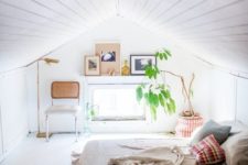 02 an all-white attic bedroom with neutral wood and textiles, with potted greenery and artworks