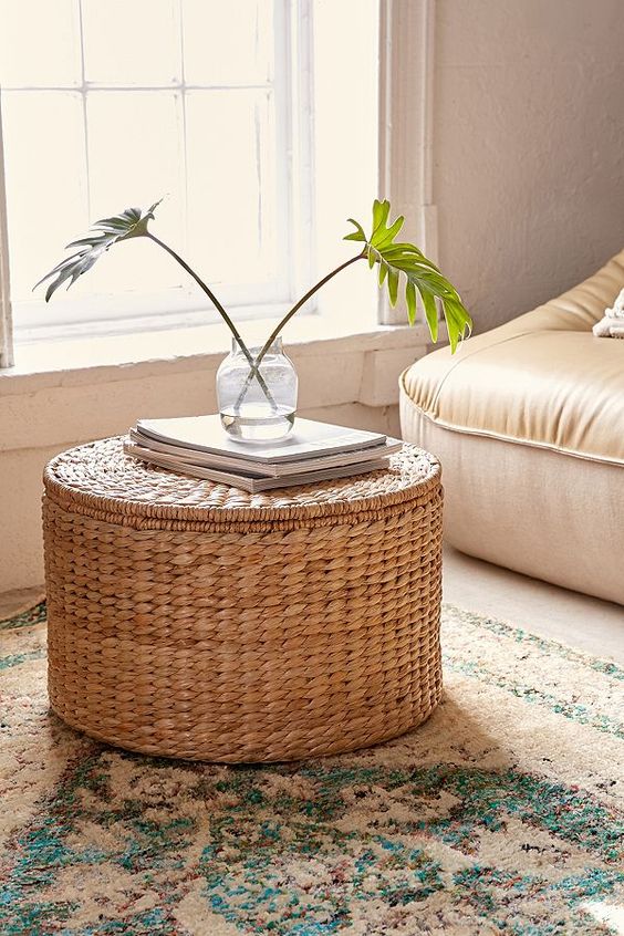 such a wicker coffee table and ottoman features a storage space inside and is great for many living rooms