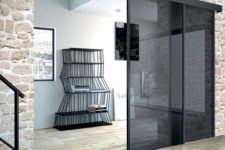 03 smoked glass sliding doors stand out in stone clad giving it a fresh and more modern look
