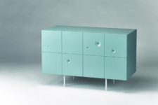 04 This is an aqua-colored cabinet of birch plywood, with severla wormholes