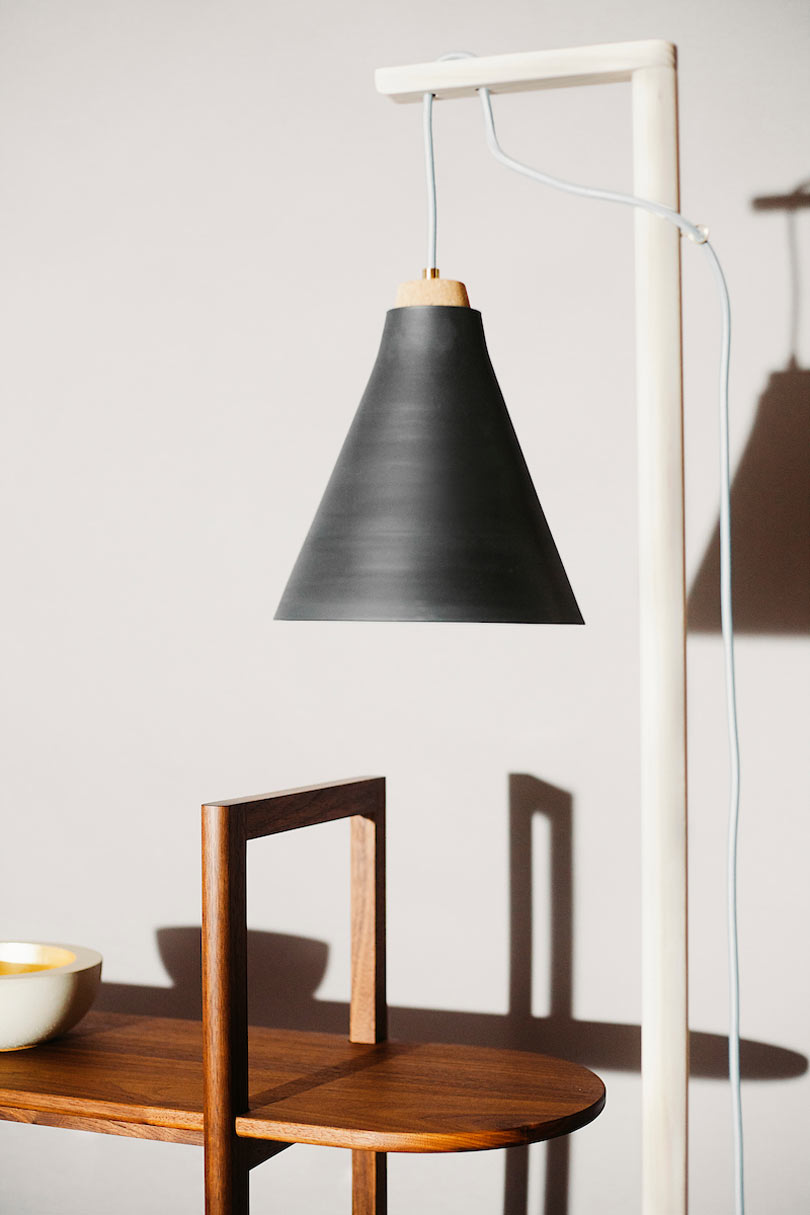The floor or table lamp from the collection features raw and minimalist easthetic