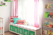 05 a colorful upholstered bench with numbered Drona boxes is a nice DIY for a nursery