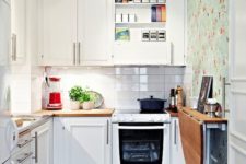 06 a tiny kitchen with a wall-mounted dining table is a great idea to save some floor space