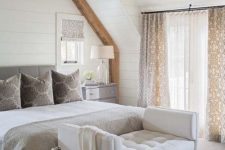 07 a creamy tufted bench at the foot of the bed is a stylish idea for a neutral sleeping space