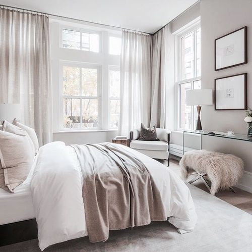 a neutral bedroom with touches of blush and dusty pink to make it catchy and add a girlish feel